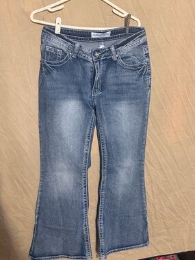 Telepath Mid Wash Flare Jeans in Blue